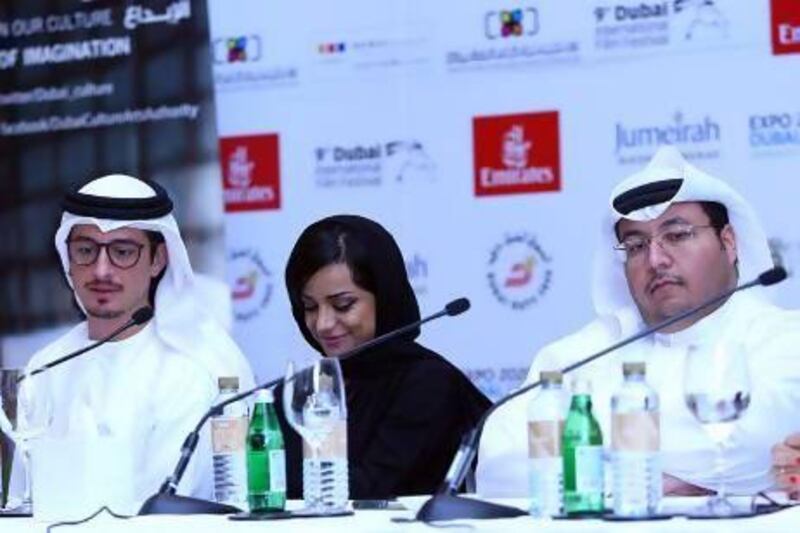 The Emirati filmmakers whose short films are part of The Soul of Dubai initiative are, fro left, Ali Mostafa, Nayla Al Khaja and Khalid Ali. Satish Kumar / The National