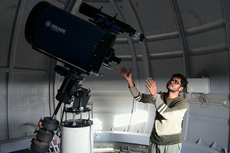 Surender Ponnalagar, senior observatory technician and astronomer, with the 16-inch Schmidt Cassegrain telescope at Al Sadeem Astronomy in Al Wathba, Abu Dhabi. All photos: Khushnum Bhandari / The National
