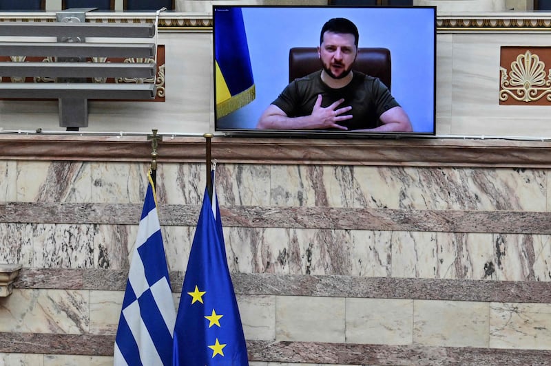 Ukraine's President Volodymyr Zelenskyy thanks MPs after his virtual address to the Greek Parliament in Athens. AFP