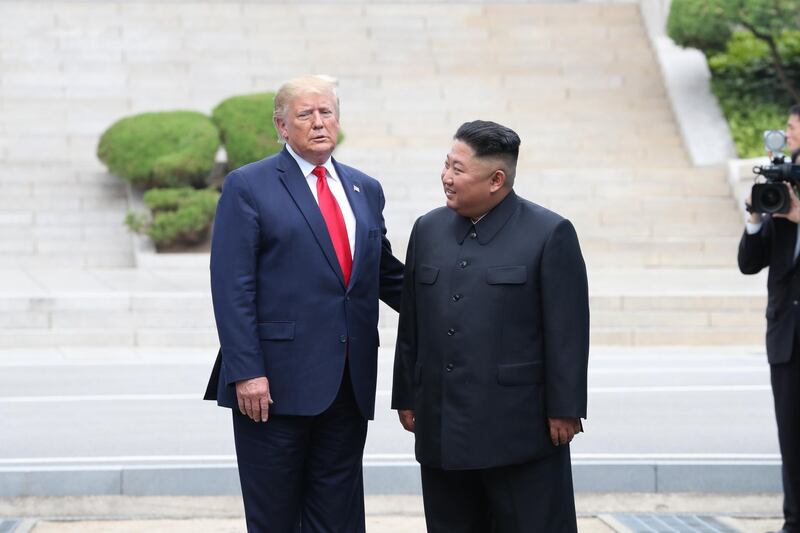 US President Donald Trump talks with North Korean leader Kim Jong-un at the demilitarised zone separating the two Koreas, in Panmunjom, South Korea.  EPA