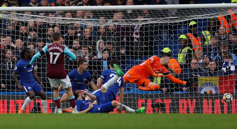 Soccer Football - Premier League - Chelsea vs West Ham United - Stamford Bridge, London, Britain - April 8, 2018   West Ham United's Javier Hernandez scores their first goal             Action Images via Reuters/Andrew Couldridge    EDITORIAL USE ONLY. No use with unauthorized audio, video, data, fixture lists, club/league logos or "live" services. Online in-match use limited to 75 images, no video emulation. No use in betting, games or single club/league/player publications.  Please contact your account representative for further details.