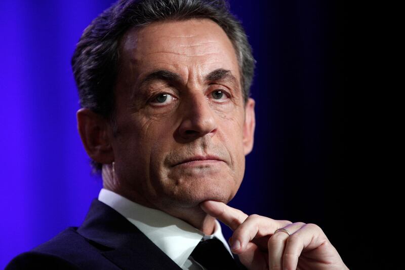 FILE - In this March 24 2015 file photo, former French President Nicolas Sarkozy attends a meeting in Asnieres, outside Paris. Sarkozy has lost an appeal against an earlier legal decision and could stand trial on charges of illegally financing his 2012 presidential campaign. (AP Photo/Thibault Camus, File)