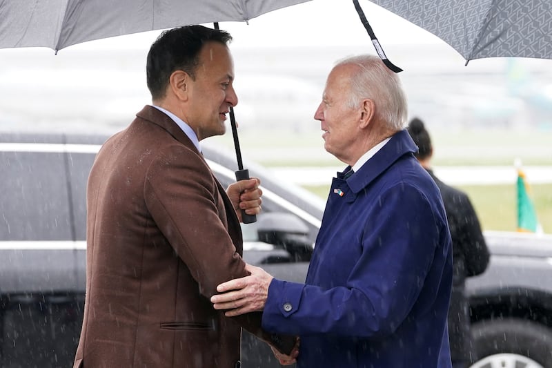 Mr Biden is greeted by Ireland's Prime Minister Leo Varadkar at the Dublin Airport. Reuters
