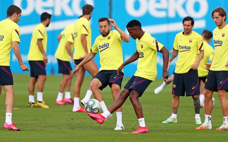 Barcelona of players Jordi Alba, Ansu Fati, Lionel Messi, and Ivan Rakitic during a training session at Joan Gamper sports city. EPA