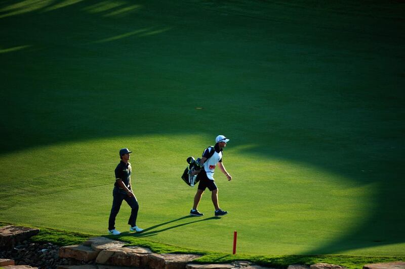 Thorbjorn Olesen of Denmark walks up to the 18th hole at Jumeirah Golf Estates. Warren Little / Getty Images