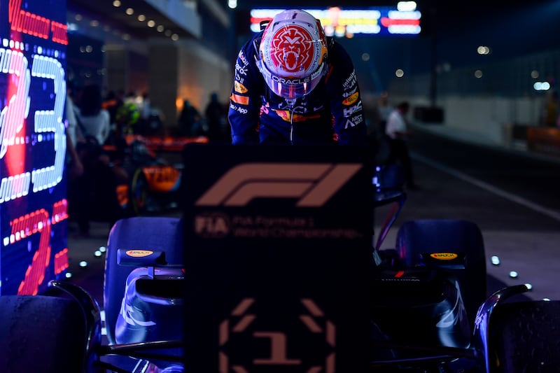 Red Bull driver Max Verstappen climbs out of his car following the sprint race at the Qatar GP in Lusail. Getty