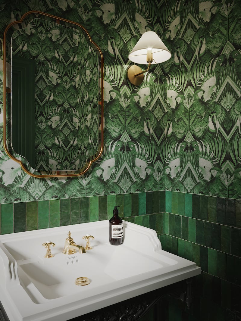 Up the glamour quotient in powder bathrooms with bold wallpaper. Photo: Divine Savages