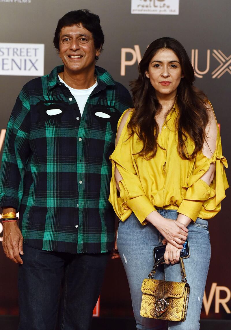 Bollywood actor Chunky Pandey, left, with his wife Bhavna Pandey attend the premiere of Hindi film 'Bharat' in Mumbai on June 4, 2019. AFP