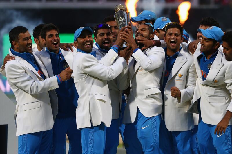 BIRMINGHAM, ENGLAND - JUNE 23:  The India squad lift the winners trophy as they celebrate their 5 run victory during the ICC Champions Trophy Final match between England and India at Edgbaston on June 23, 2013 in Birmingham, England.  (Photo by Michael Steele/Getty Images) *** Local Caption ***  171227336.jpg