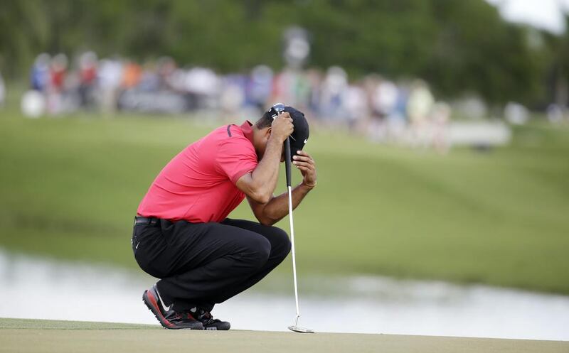World No 1 Tiger Woods has completed just two starts in 2.5 months, and needs tournament competition to hone his game, but his back needs rest and rehab. Lynne Sladky / AP Photo