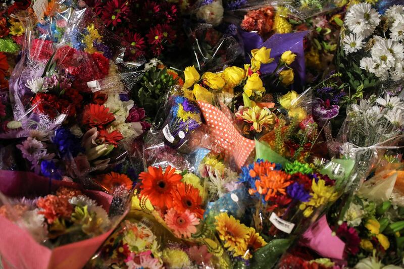 Floral tributes become a makeshift memorial on the street in London, Ontario, Canada, where a pick-up struck five members of a Muslim family in what police say was a hate crime. Four people were killed in the attack. Reuters