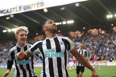 NEWCASTLE UPON TYNE, ENGLAND - APRIL 02: Newcastle striker Callum Wilson celebrates after scoring the second Newcastle goal during the Premier League match between Newcastle United and Manchester United at St. James Park on April 02, 2023 in Newcastle upon Tyne, England. (Photo by Stu Forster / Getty Images)