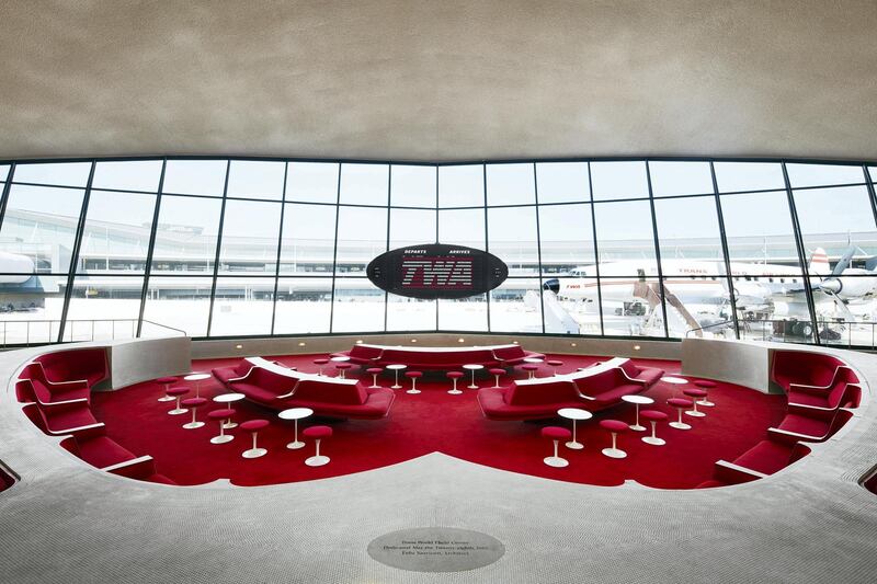 The Sunken Lounge previously hosted The Beatles and now has a view of the Lockheed Constellation, which doubles as a bar. Courtesy TWA Hotel / David Mitchell