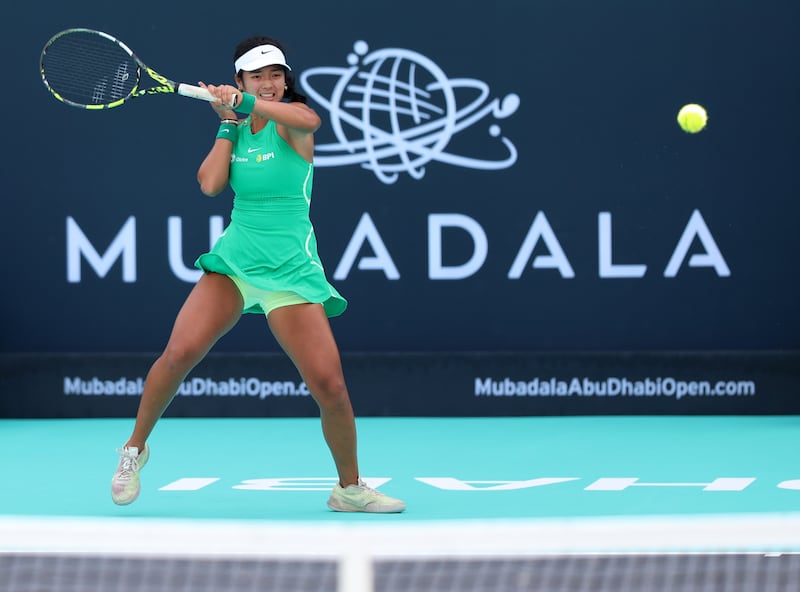 Alex Eala returns the ball during her defeat against Magda Linette on Day 2 of the Mubadala Abu Dhabi Open at Zayed Sports City on February 6, 2024. All images by Chris Whiteoak / The National