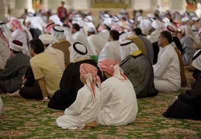 Muslims pray at Grand Sheikh Zayed Mosque during the Islamic high holiday Isra wal Miraj. Jaime Puebla / The National