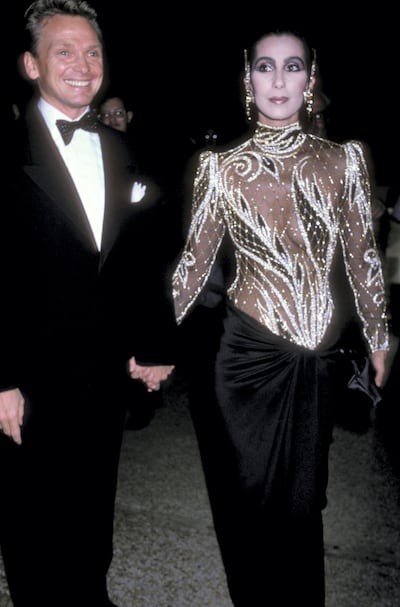 NEW YORK CITY - DECEMBER 9:   Fashion designer Bob Mackie and singer/actress Cher attend The Metropolitan Museum's Costume Institute Gala Exhibition of "Costumes of Royal India" on December 9, 1985 at The Metropolitan Museum of Art in New York City. (Photo by Ron Galella/WireImage)