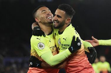 Manchester City's Gabriel Jesus celebrates scoring the winning goal with Riyad Mahrez. Reuters