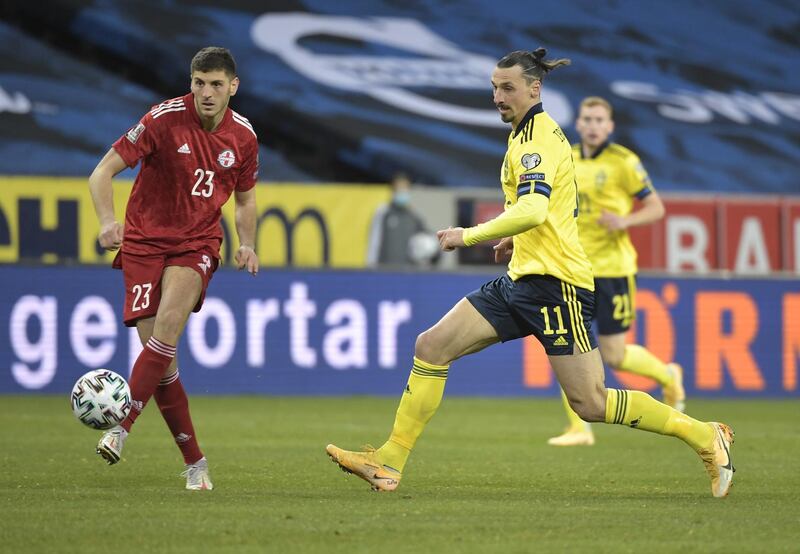 Sweden's Zlatan Ibrahimovic with Georgia's Lasha Dvali at Friends Arena in Stockholm. Reuters