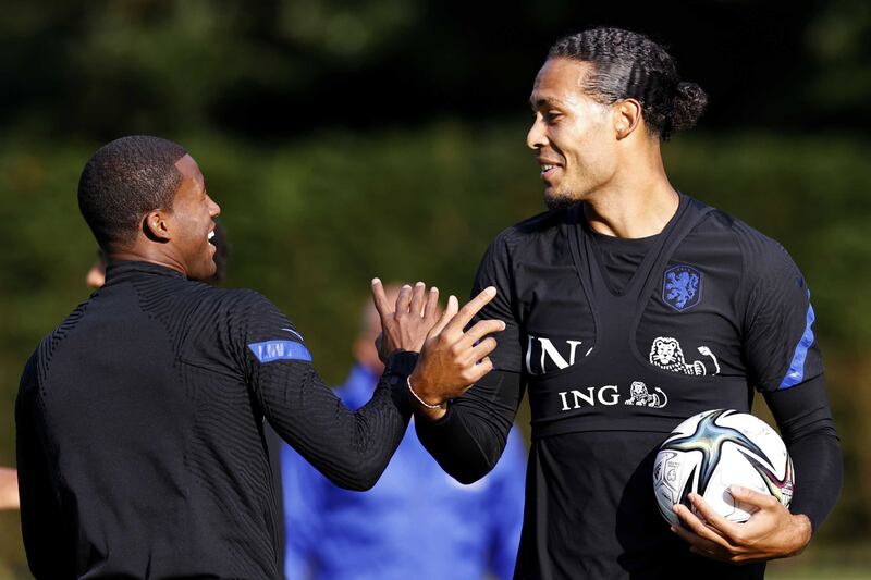 Netherlands' national soccer players Georginio Wijnaldum (L) and Virgil van Dijk during a training session in Zeist, the Netherlands, 30 August 2021.  The Netherlands will face Norway on 01 September 2021 in their Group G qualifying soccer match for the Qatar 2022 FIFA World Cup.   EPA / MAURICE VAN STEEN