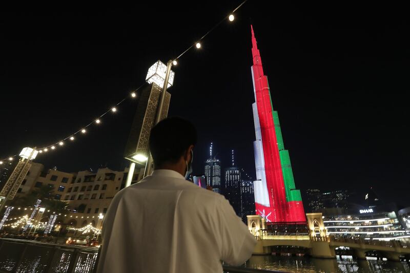 DUBAI, UNITED ARAB EMIRATES , November 18 – 2020 :- Omani flag displayed on the Burj Khalifa in Dubai for Oman’s 50th National Day. (Pawan Singh / The National) For News/Standalone/Big Picture/Online/Instagram