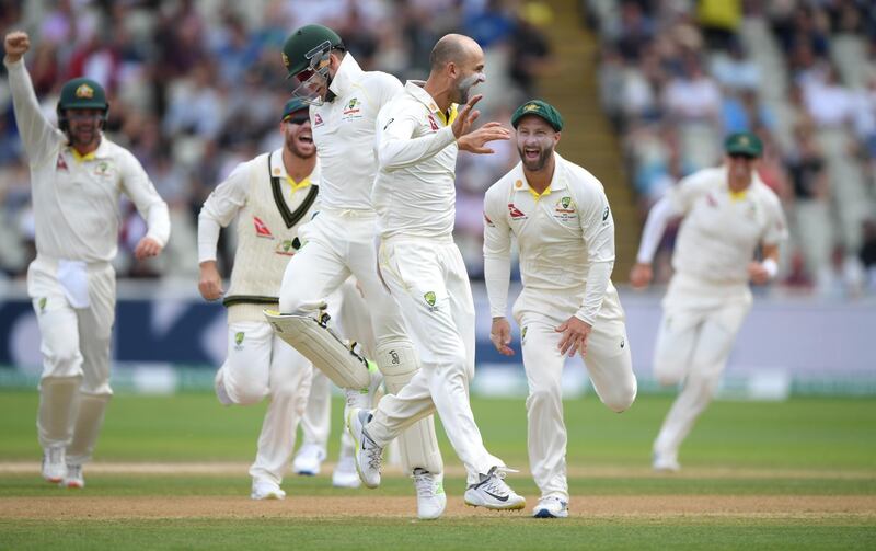 BIRMINGHAM, ENGLAND - AUGUST 05: Australia captain Tim Paine celebrates with Nathan Lyon after the pair had combined to dismiss Ben Stokes during the fifth day of the 1st Test match between England and Australia at Edgbaston on August 05, 2019 in Birmingham, England. (Photo by Stu Forster/Getty Images)