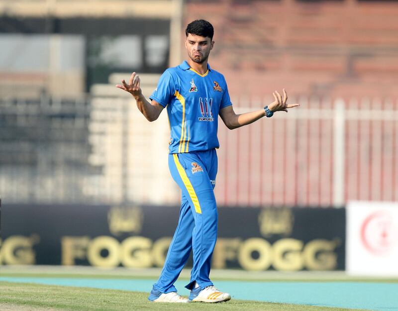 Sharjah, United Arab Emirates - October 06, 2018: Naveen-ul-Haq of the Nangarhar Leopards takes the wicket of Karim Sadiq of the Kandahar Knights during the game between Kandahar Knights and Nangarhar Leopards in the Afghanistan Premier League. Saturday, October 6th, 2018 at Sharjah Cricket Stadium, Sharjah. Chris Whiteoak / The National