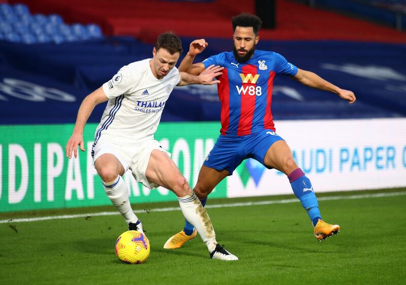 Leicester City's Jonny Evans and Crystal Palace's Andros Townsend, right, battle for the ball. PA