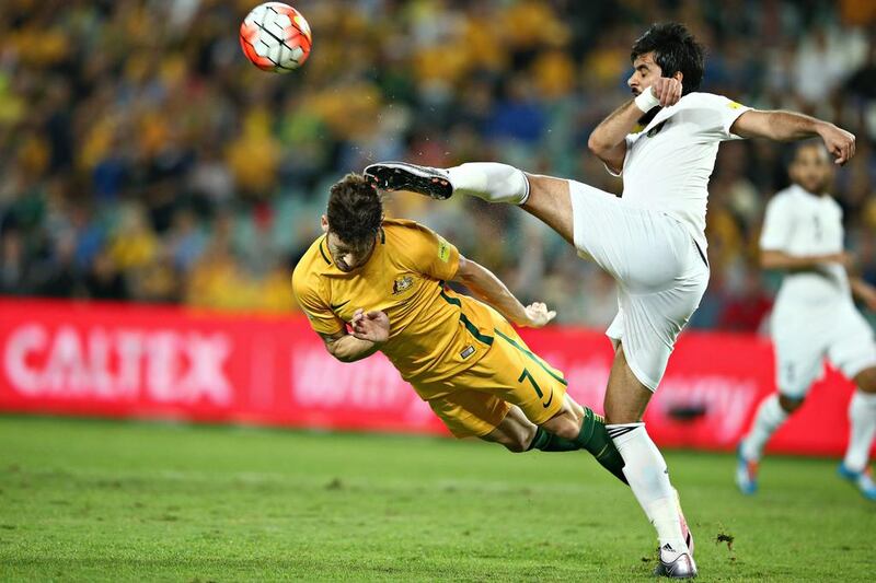 Australia’s Mathew Leckie dives to head the ball as it is cleared by Mohammad Al Basha of Jordan during a 2018 World Cup qualification match in Sydney. Mark Kolbe / Getty Images