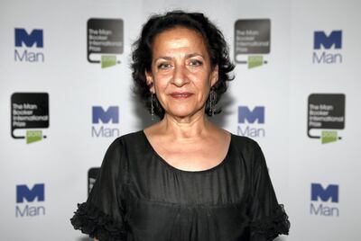 Lebanese writer Hoda Barakat, one of the ten finalists for the 2015 Man Booker International Prize poses for a photograph at the Victoria and Albert Museum in London on May 19, 2015, ahead of tonight's award announcement. The £60,000 prize, awarded every two years, highlight's one writer's contribution to fiction on the world stage.   AFP PHOTO / ADRIAN DENNIS (Photo by ADRIAN DENNIS / AFP)