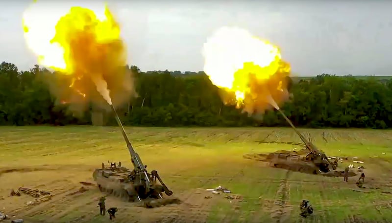 Russian Malka artillery systems are fired from an undisclosed location in Ukraine. AP