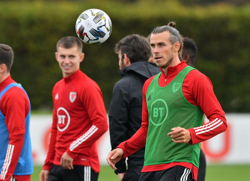 Wales' Gareth Bale (right) during the training session at the Vale Resort. PA