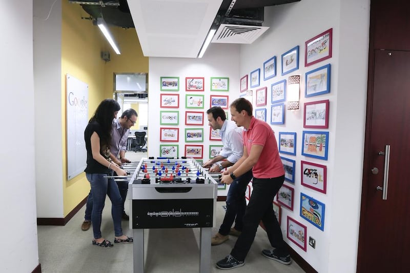 Google employees play football at the internet giant’s Dubai Media City office during a break from work. Sarah Dea / The National