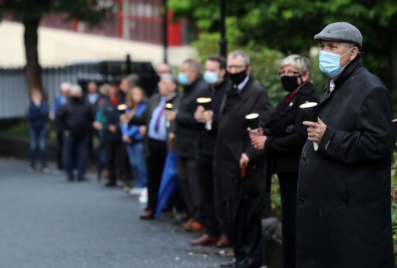 Mourners waiting for the funeral procession of John Hume gather outside St Eugene's Cathedral. Reuters
