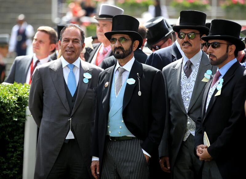 Sheikh Mohammed bin Rashid and Abdulla Al Mansoori, left, at Ascot Racecourse. Adam Davy / PA Wire