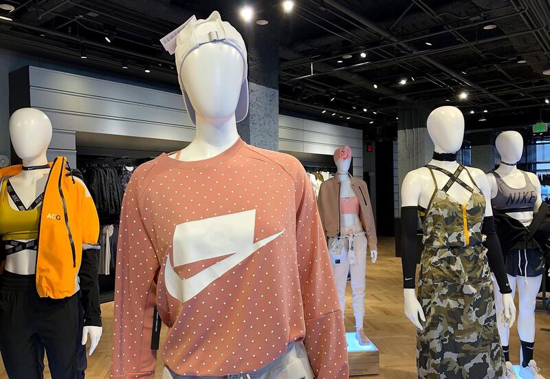 SAN FRANCISCO, CA - AUGUST 10: Nike clothing is displayed at a Nike Store on August 10, 2018 in San Francisco, California. Former Nike employees Kelly Cahill and Sara Johnston have filed a gender discrimination lawsuit against the shoe and apparel company claiming that they were subjected to a hostile work culture and made less than male colleagues even though they had comparable work performance.   Justin Sullivan/Getty Images/AFP
== FOR NEWSPAPERS, INTERNET, TELCOS & TELEVISION USE ONLY ==
