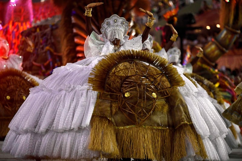 A member of the Grande Rio samba school performs during the first night of Rio's carnival. AFP