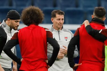 Iraq head coach Jesus Casas (C) talks to his players during training session on the eve of the international friendly match between Russia and Iraq on March 25, 2022 at Gazprom Arena in Saint Petersburg, Russia. (Photo by Mike Kireev/NurPhoto via Getty Images)