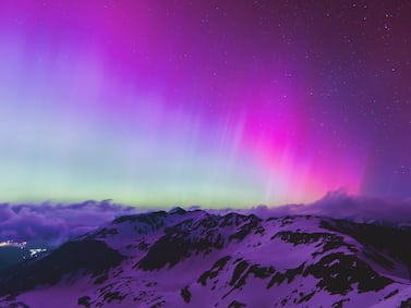 Northern lights or aurora borealis illuminate the night sky over Fusch an der Großglocknerstraße, near Zell am See, during a geomagnetic storm on May 11, 2024.  The planet is experiencing its first "extreme" geomagnetic storm since 2003, a US agency said on Mai 10, 2024.  (Photo by JFK  /  APA  /  AFP)  /  Austria OUT