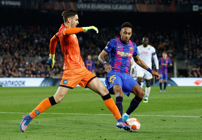 Barcelona's Pierre-Emerick Aubameyang against Napoli's Alex Meret. Reuters