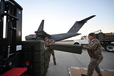Ukrainian servicemen move US-made FIM-92 Stinger missiles from Lithuania to Boryspil Airport in Kyiv. AFP