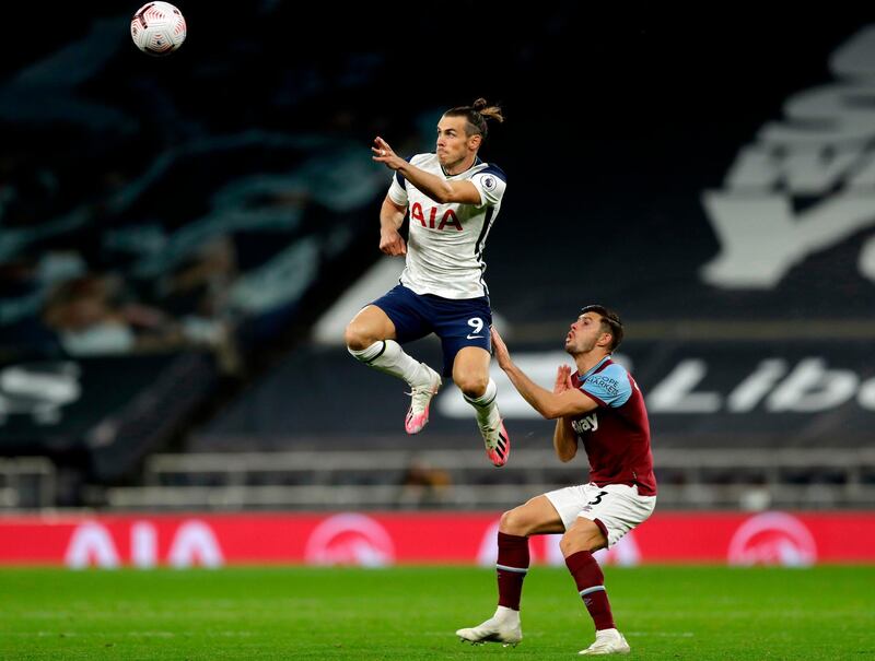 Tottenham Hotspur's Gareth Bale leaps to head the ball during his team's 3-3 Premier League draw with West Ham United on Sunday, October 18. AFP