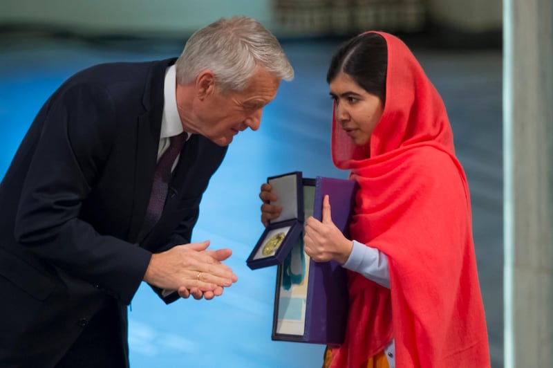 OSLO, NORWAY - DECEMBER 10:  Thorbjorn Jagland of Norway and Malala Yousafzai accepts the Nobel Peace Prize Award during the Nobel Peace Prize ceremony at Oslo City Town Hall on December 10, 2014 in Oslo, Norway. (Photo by Nigel Waldron/Getty Images)