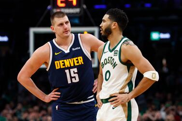 BOSTON, MA - JANUARY 19: Nikola Jokic #15 of the Denver Nuggets talks with Jayson Tatum #0 of the Boston Celtics during the second quarter at TD Garden on January 19, 2024 in Boston, Massachusetts. NOTE TO USER: User expressly acknowledges and agrees that, by downloading and/or using this Photograph, user is consenting to the terms and conditions of the Getty Images License Agreement. (Photo By Winslow Townson/Getty Images)