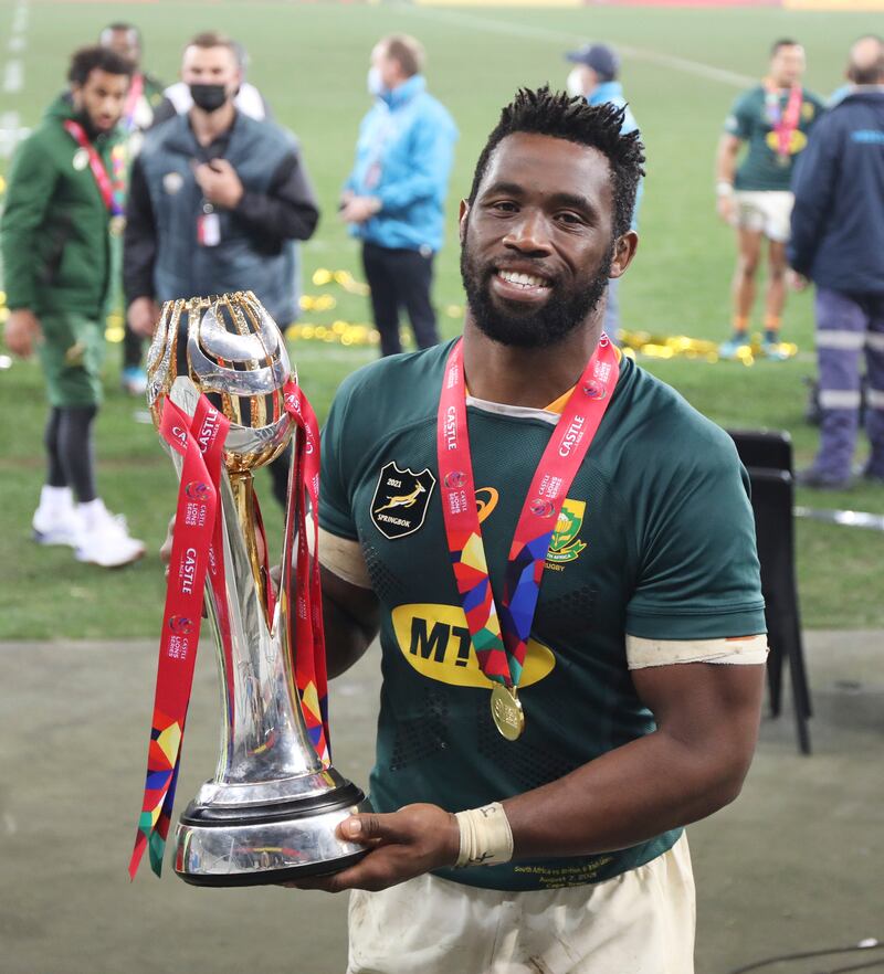 Siya Kolisi of South Africa holds aloft the series trophy after beating the the British and Irish Lions during the third and final Test at the Cape Town Stadium. The Springboks won the match 19-16 to take the series 2-1.