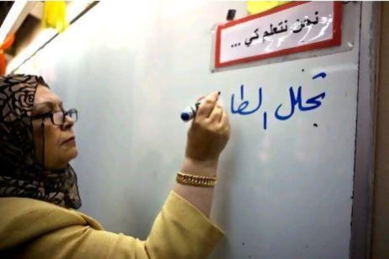 An Arabic-language teacher at a school in Bani Yas. Dubai has launched initiatives to promote the language. Silvia Rázgová / The National