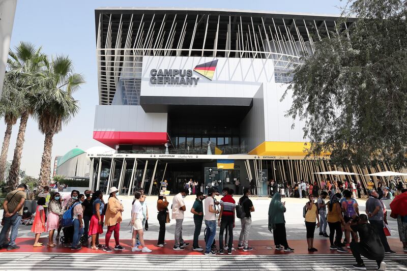 Visitors stand in a queue outside the Germany pavilion at Expo 2020 Dubai. All photos: Pawan Singh / The National