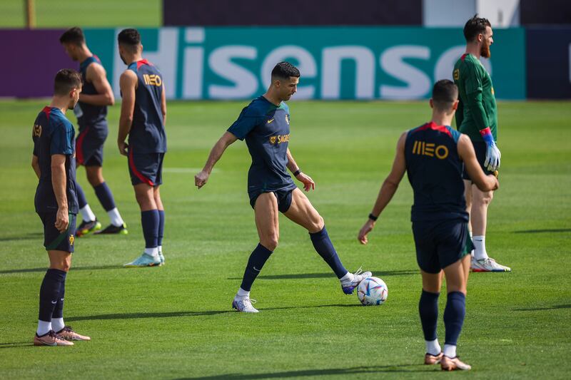 Cristiano Ronaldo attends during a training session in Al Shahhniya, Qatar, 20 November 2022. EPA