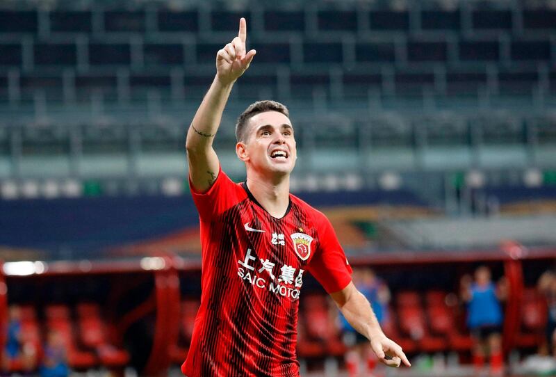 Shanghai SIPG's Oscar gestures to fans during the team's Chinese Super League win over Beijing Guoan in Suzhou, in China's eastern Jiangsu province. AFP