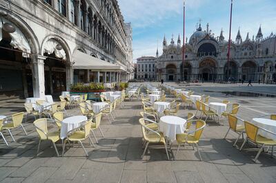 Empty chairs and tables are lined up outside a restaurant in St. Mark's Square in Venice, Italy, Monday, March 9, 2020. Italy took a page from Chinaâ€™s playbook Sunday, attempting to lock down 16 million people â€” more than a quarter of its population â€” for nearly a month to halt the relentless march of the new coronavirus across Europe. Italian Premier Giuseppe Conte signed a quarantine decree early Sunday for the countryâ€™s prosperous north. Areas under lockdown include Milan, Italyâ€™s financial hub and the main city in Lombardy, and Venice, the main city in the neighboring Veneto region. (Anteo Marinoni/LaPresse via AP)