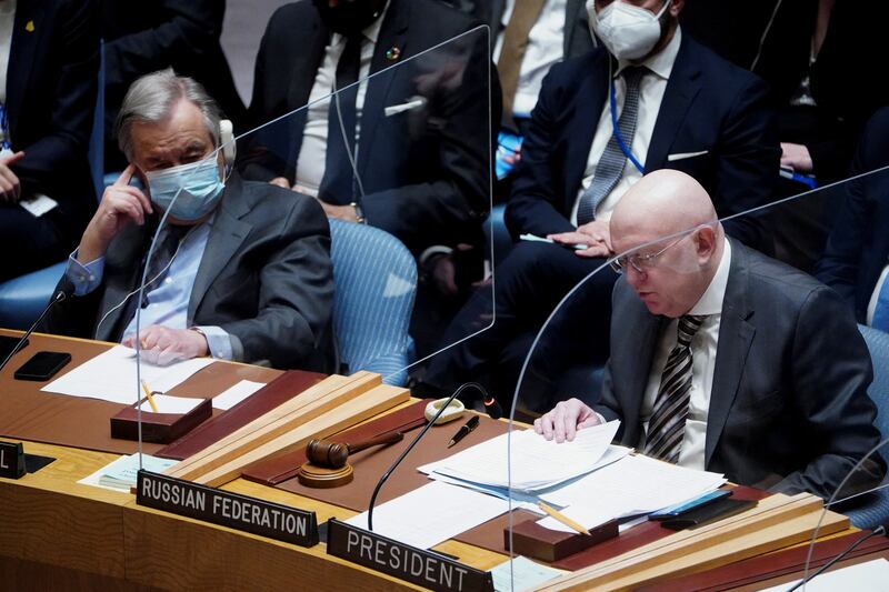 UN Secretary General Antonio Guterres and Russia's Ambassador to the UN, Vassily Nebenzia, attend a Security Council meeting in New York to discuss the crisis in Ukraine. Reuters